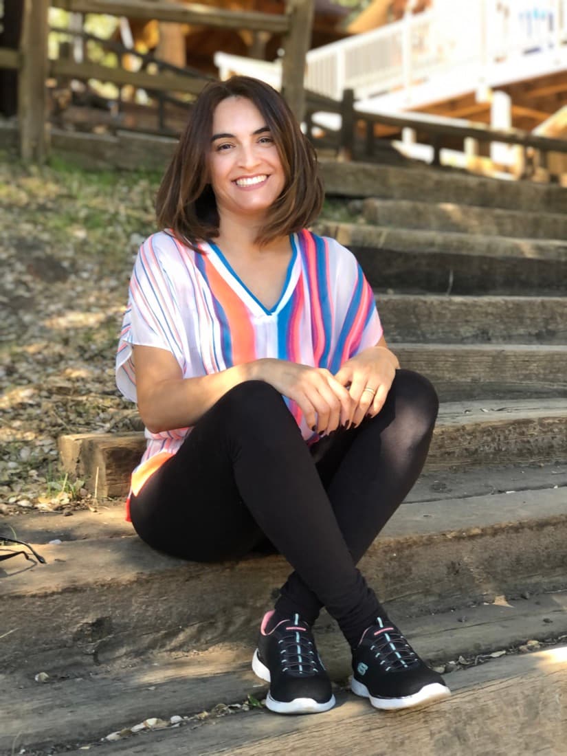 Maria Luiza, the real house cleaner behind CleanerFlow Agenda, warm and smiling